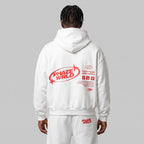 Model from behind wearing the Every Phase white boxy hoodie with red text and graphics on the back.