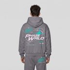 Model's back view wearing the grey Into The Phaze Boxy Hoodie, displaying the large futuristic graphics on the back and hood.
