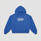 Front flat lay of the Lapis Blue Stellar Boxy Hoodie with its kangaroo pocket and white 'PHAZE WRLD' oval chest graphic.