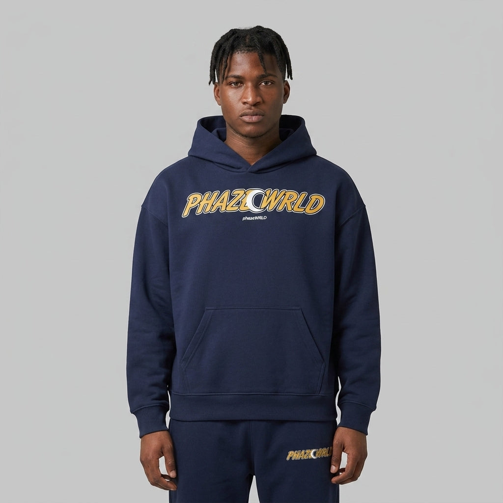 A premium heavyweight navy blue oversized streetwear hoodie with a golden yellow arched logo graphic and a front kangaroo pocket.