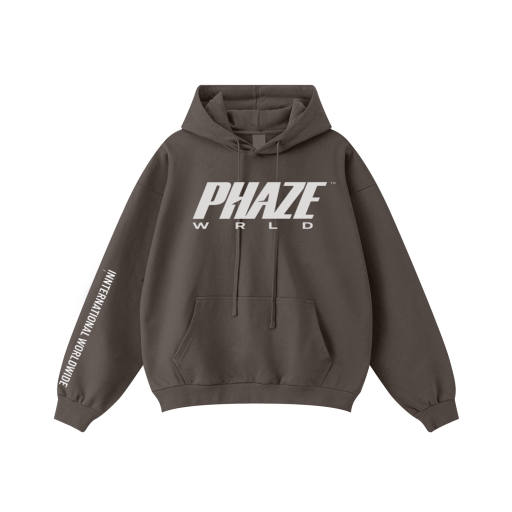 Oversized & Boxy brown streetwear hoodie featuring white PHAZE WRLD chest graphic and sleeve print, heavy cotton drop shoulder fit with kangaroo pocket.