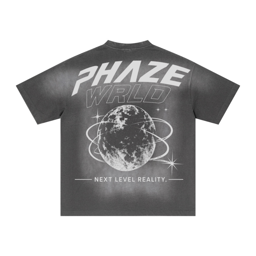 Oversized Streetwear graphic tee in faded gray featuring a bold PHAZE WRLD globe print, boxy fit, and heavy vintage wash cotton.