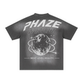 Oversized Streetwear graphic tee in faded gray featuring a bold PHAZE WRLD globe print, boxy fit, and heavy vintage wash cotton.