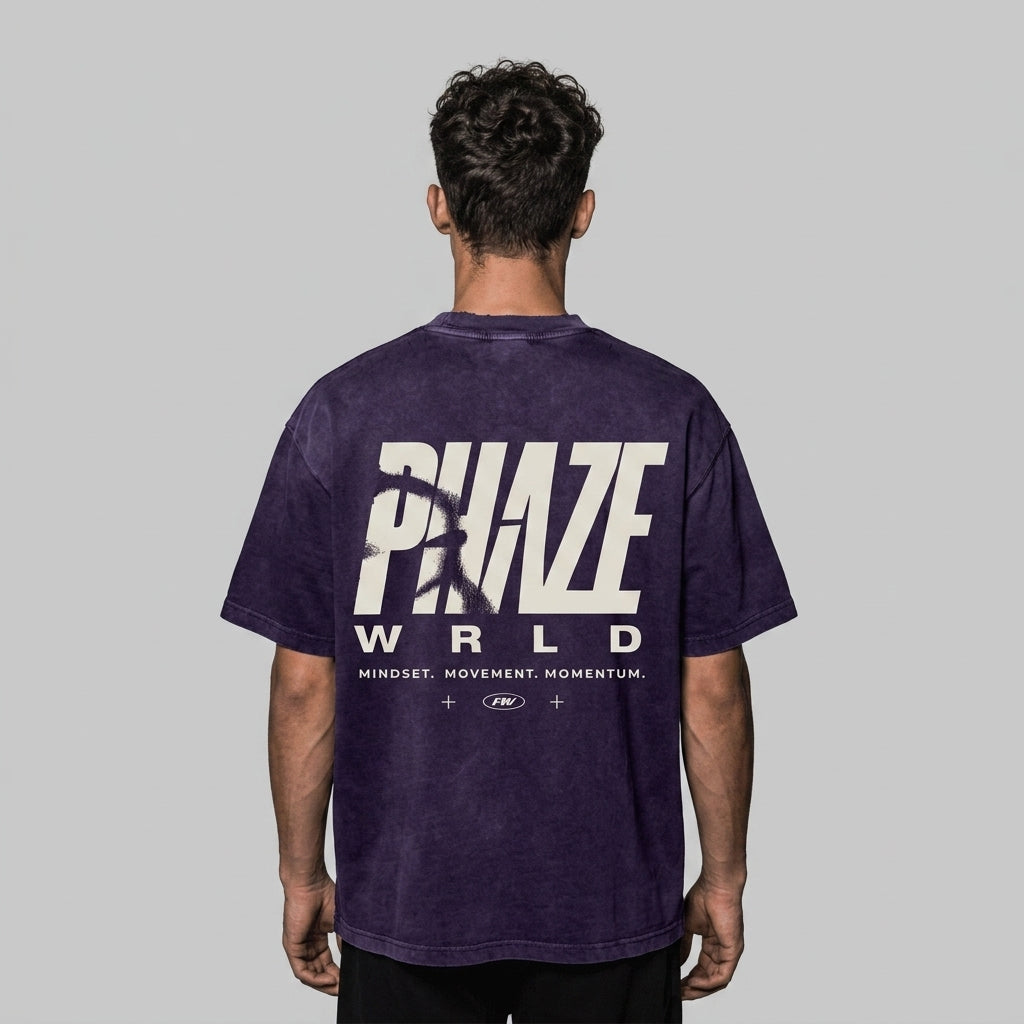 A back view of a washed purple oversized heavyweight streetwear t-shirt featuring a bold off-white graphic print and boxy fit.