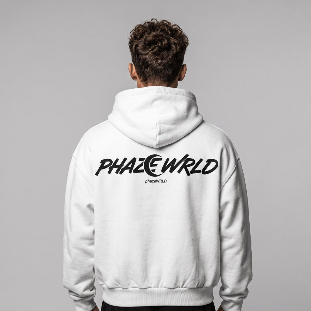 Back view of a premium white oversized heavyweight streetwear hoodie featuring a bold black PHAZE WRLD logo graphic on the upper back.